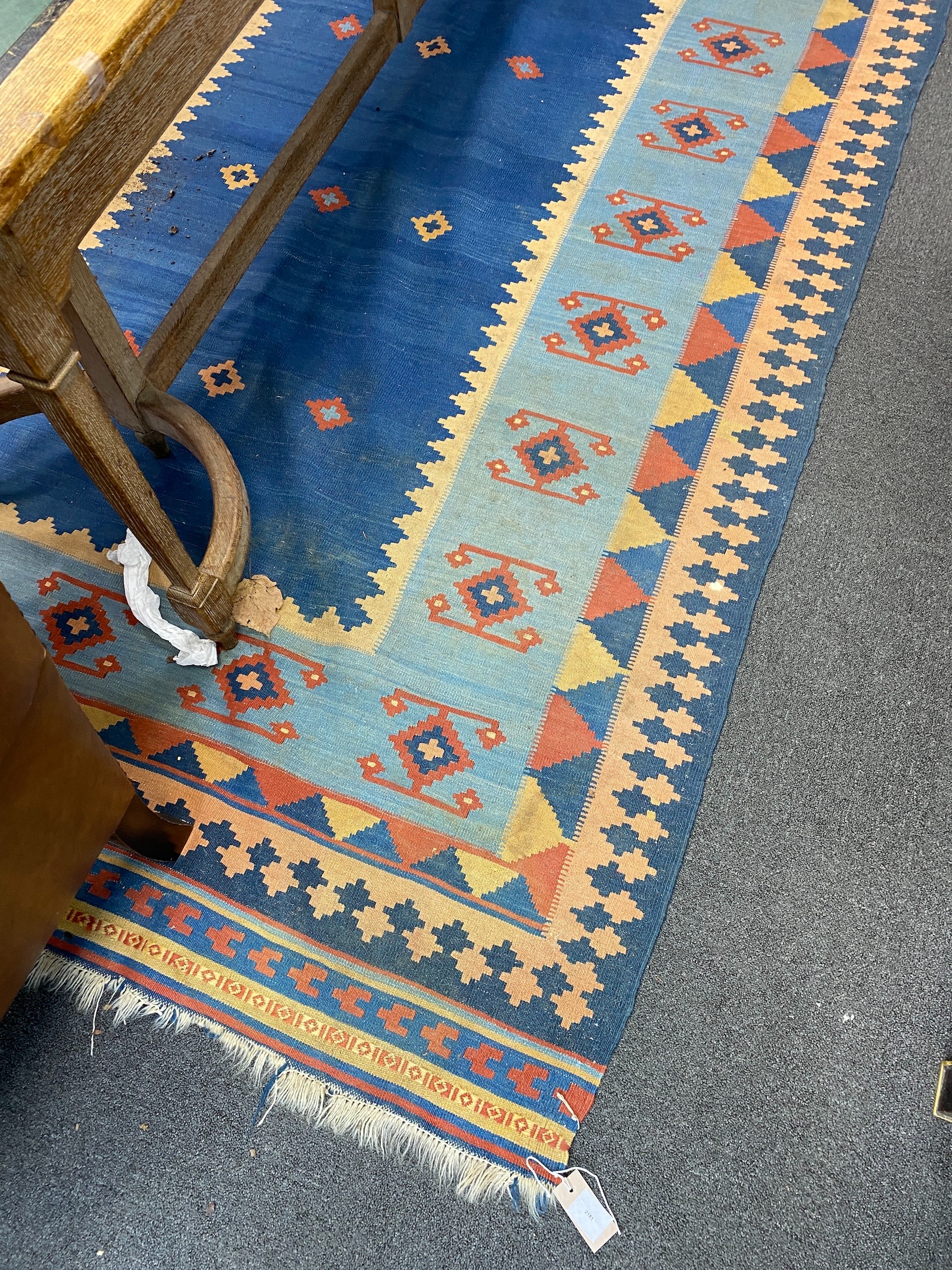 A Kilim polychrome flatweave rug, 260 x 178cm